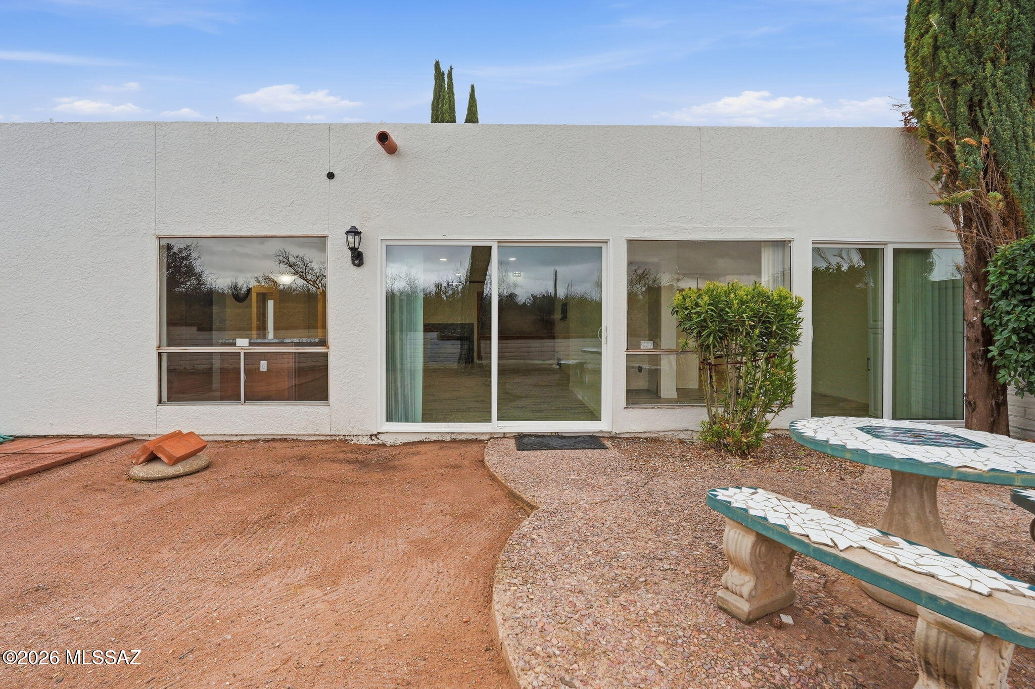 1183 Circulo Canario Rio Rico, AZ 85648 - Photo 24 of 31 a view of a lounge chair in front of the house