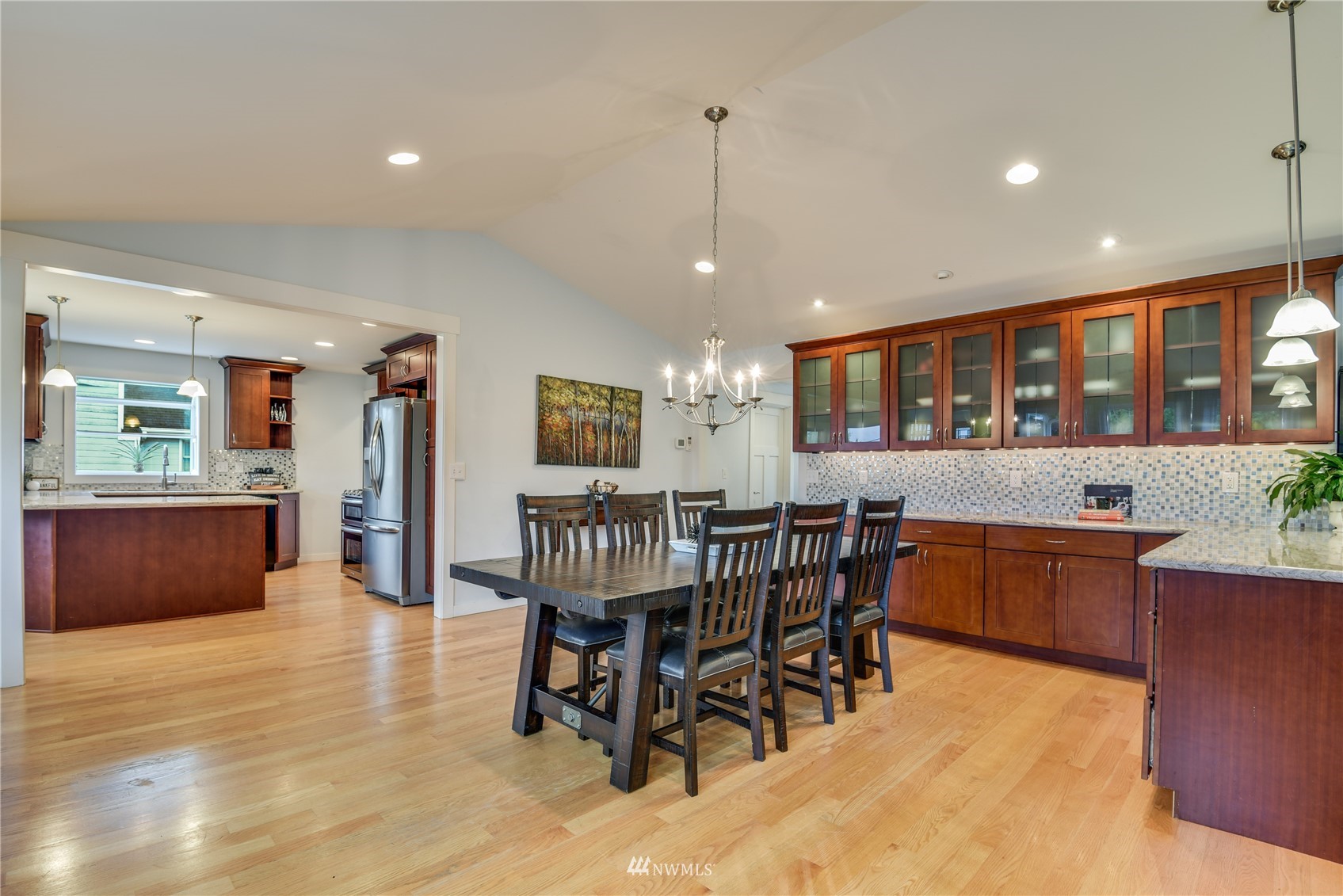 23118 Brier Road Brier, WA 98036 - Photo 10 of 40 a view of a dining room with furniture window and wooden floor
