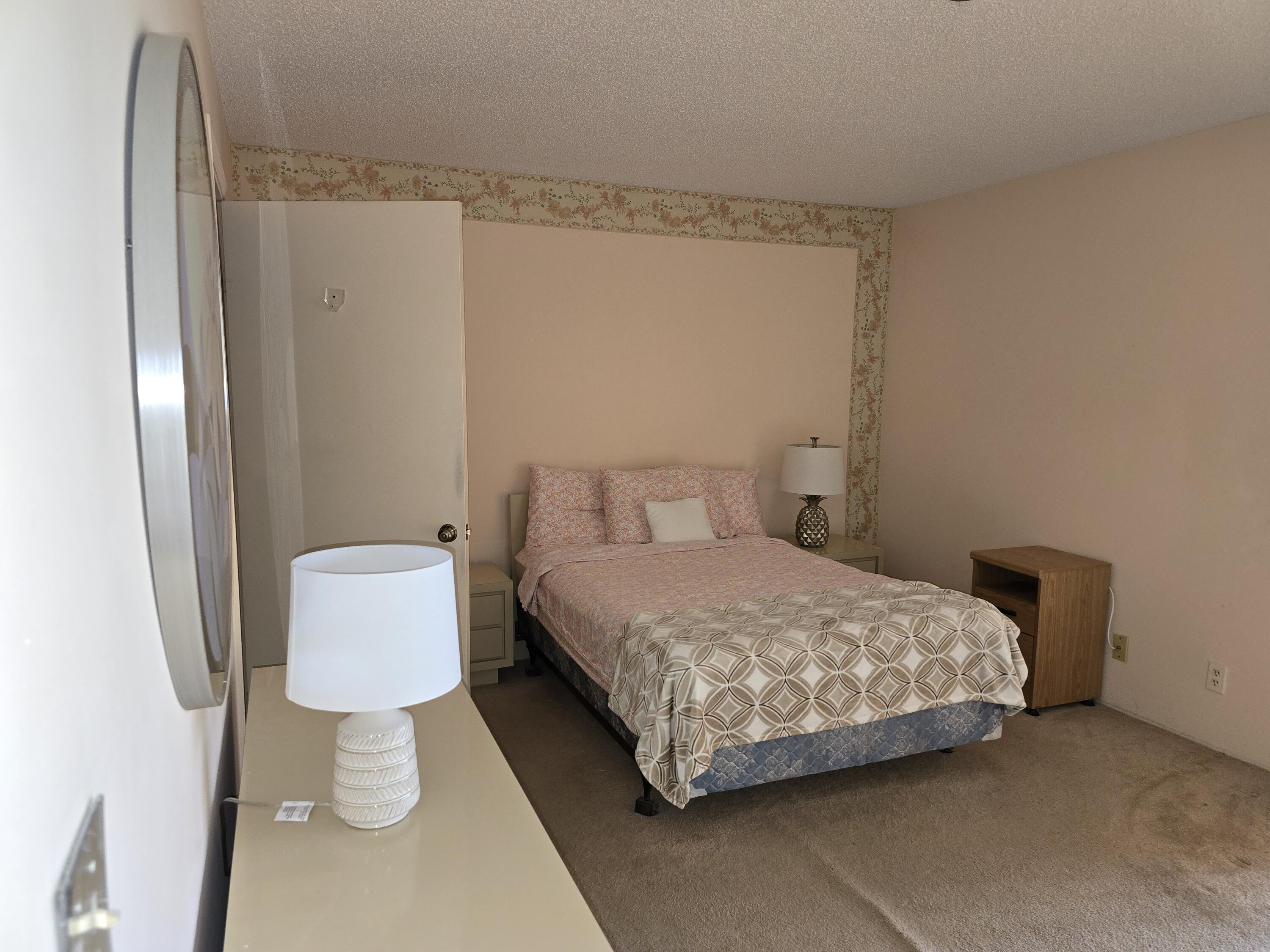 2100 Springdale Boulevard, Unit 306 Palm Springs, FL 33461 - Photo 12 of 21 Primary Bdrm