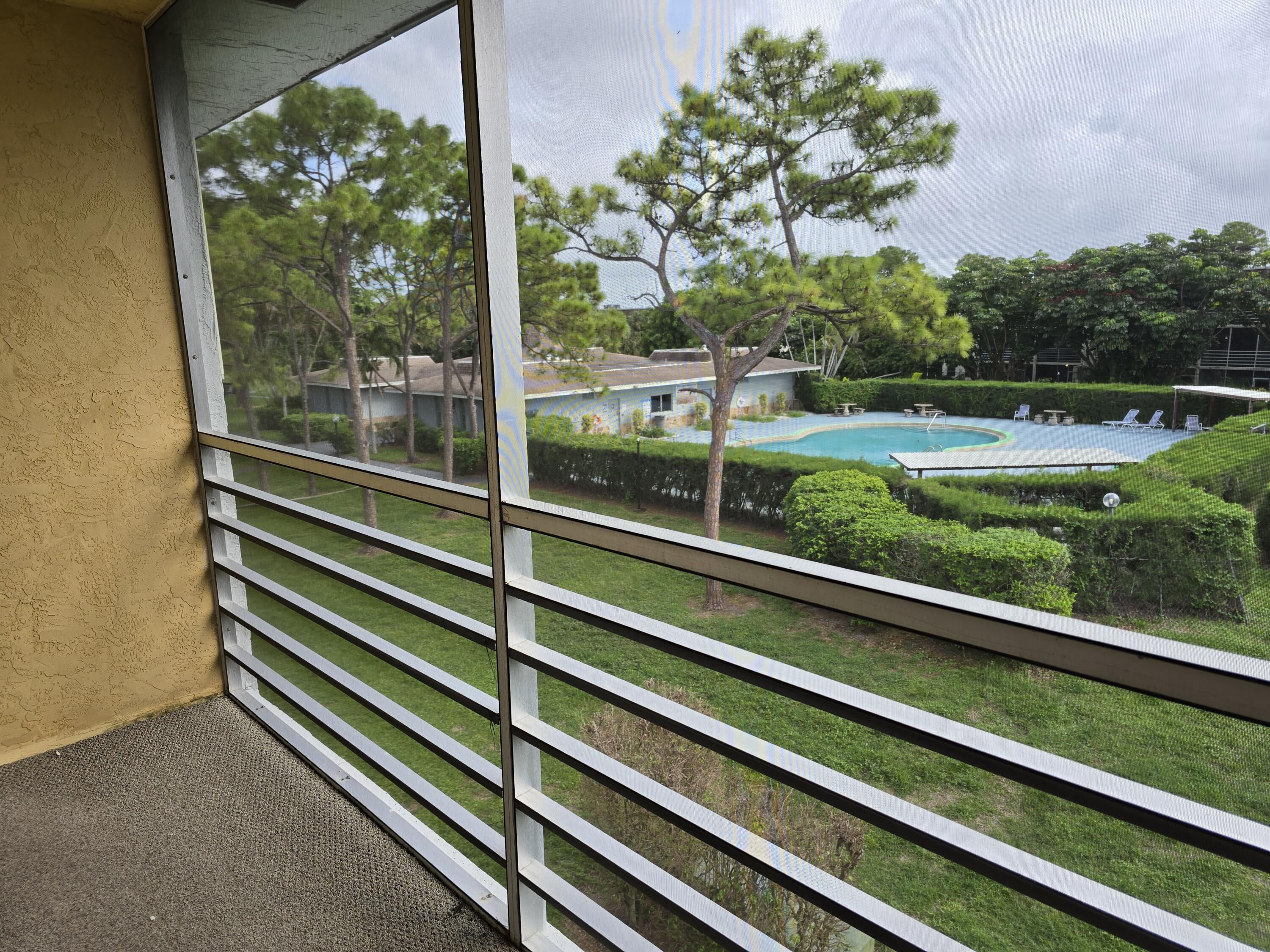 2100 Springdale Boulevard, Unit 306 Palm Springs, FL 33461 - Photo 16 of 21 Balcony