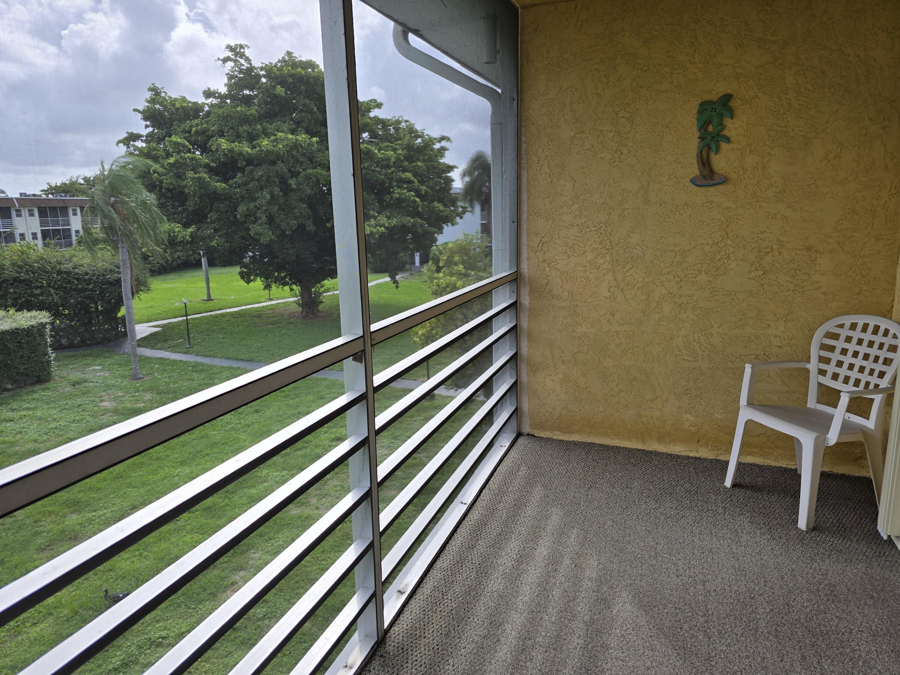 2100 Springdale Boulevard, Unit 306 Palm Springs, FL 33461 - Photo 17 of 21 Balcony