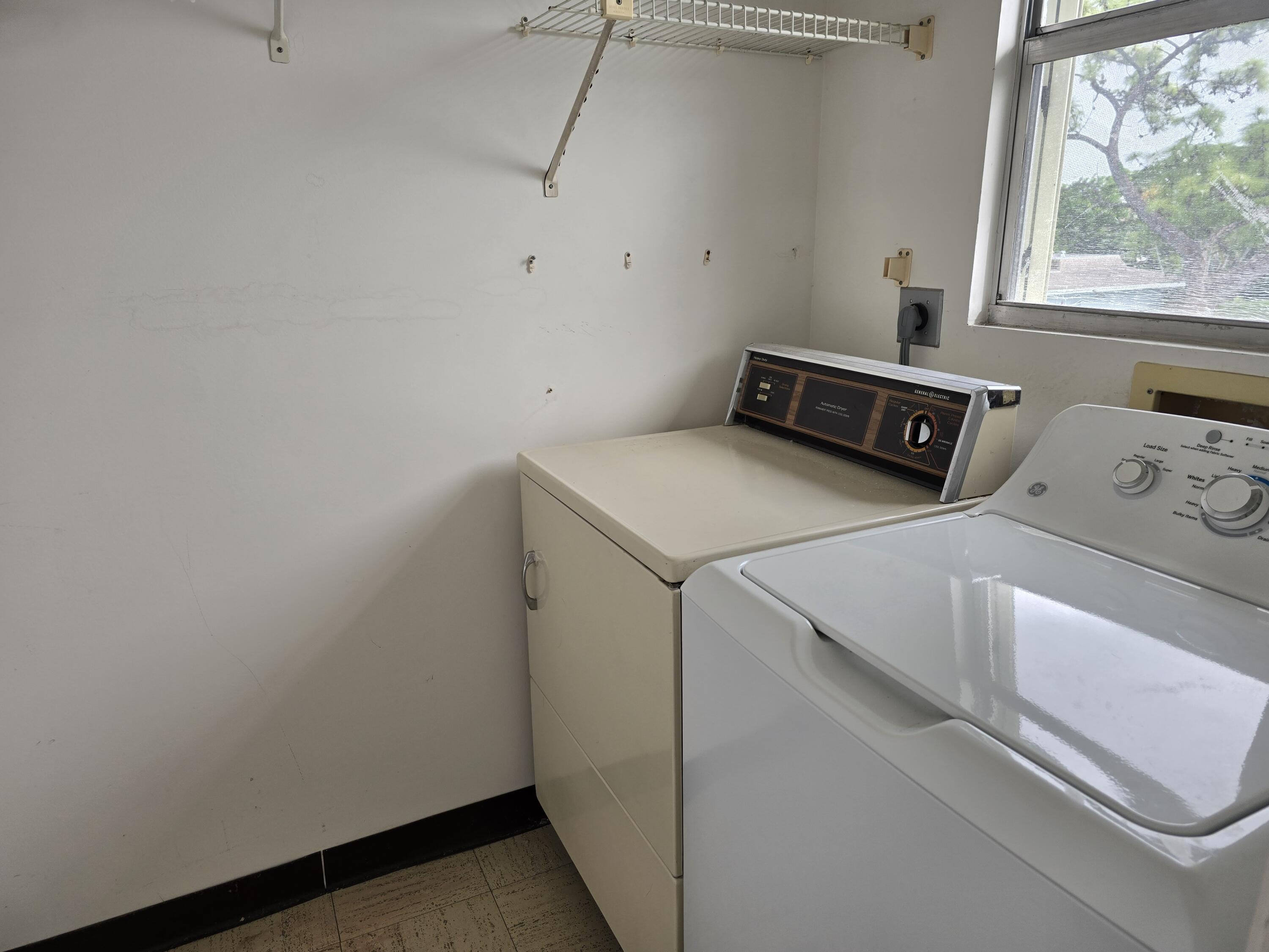 2100 Springdale Boulevard, Unit 306 Palm Springs, FL 33461 - Photo 18 of 21 private utility room