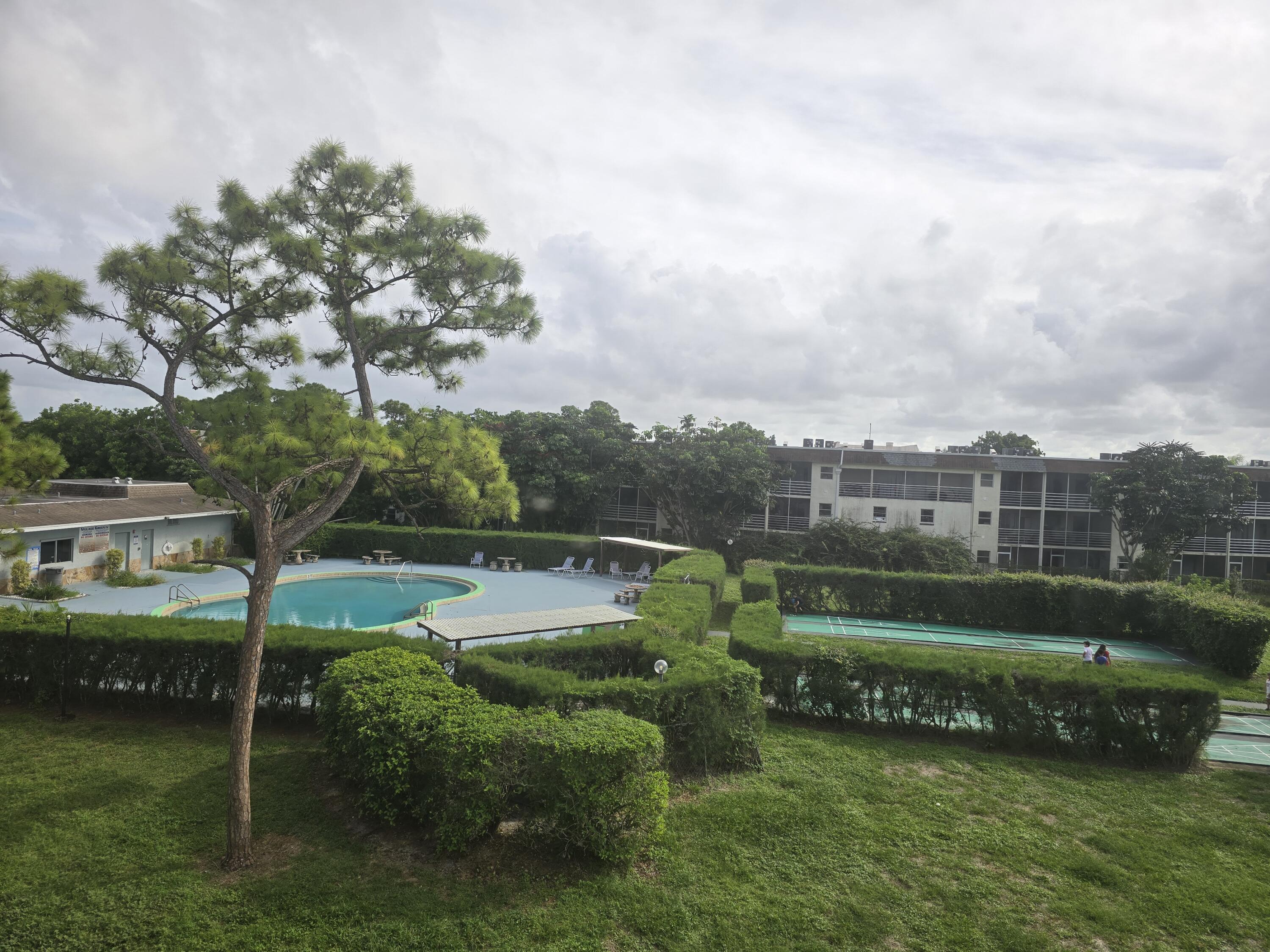 2100 Springdale Boulevard, Unit 306 Palm Springs, FL 33461 - Photo 19 of 21 Pool