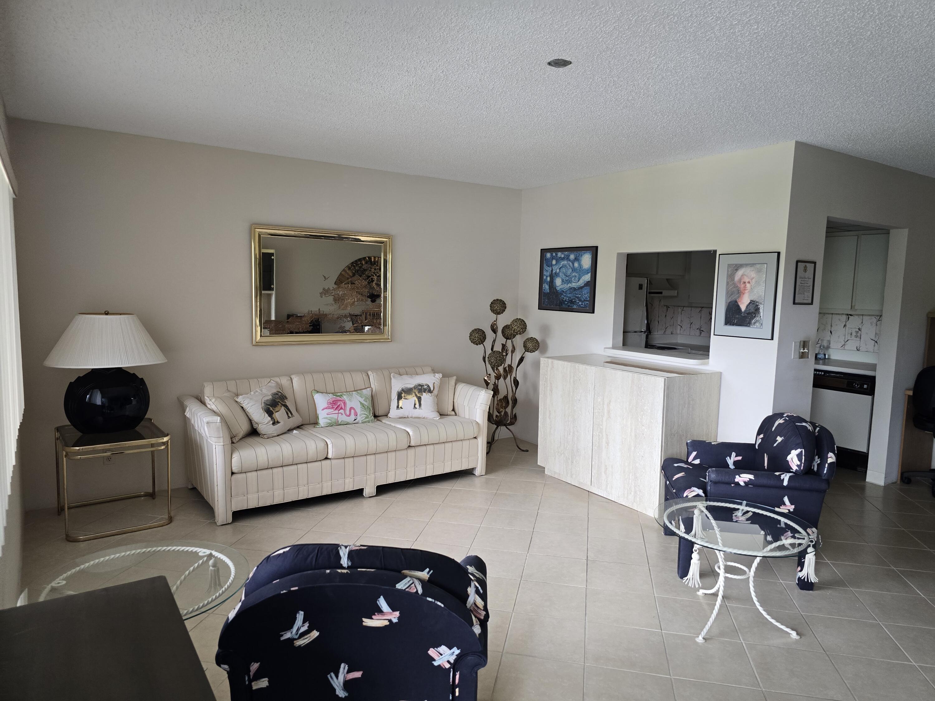 2100 Springdale Boulevard, Unit 306 Palm Springs, FL 33461 - Photo 2 of 21 Living room