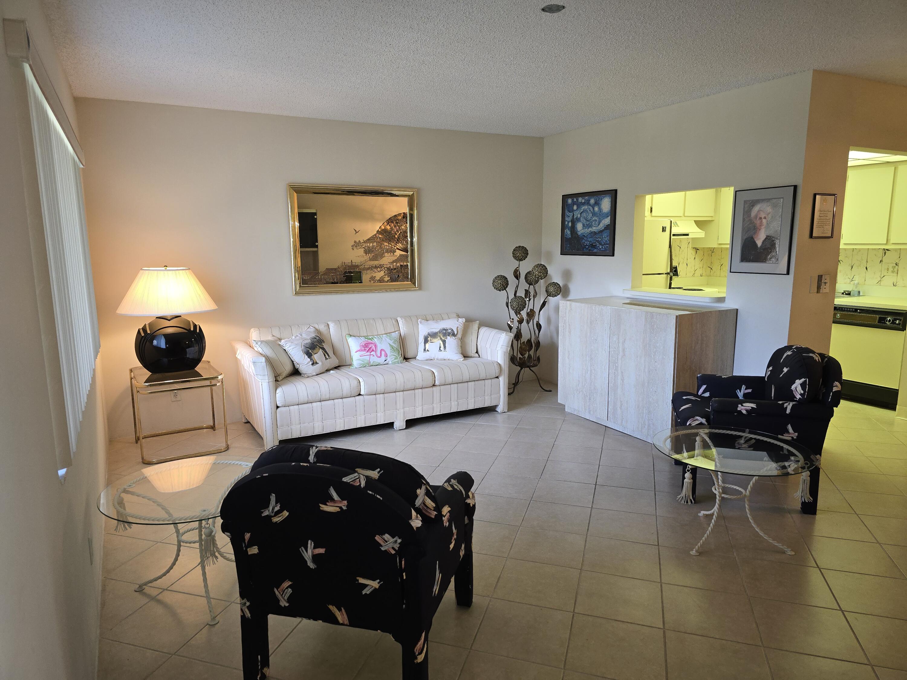 2100 Springdale Boulevard, Unit 306 Palm Springs, FL 33461 - Photo 3 of 21 Living room