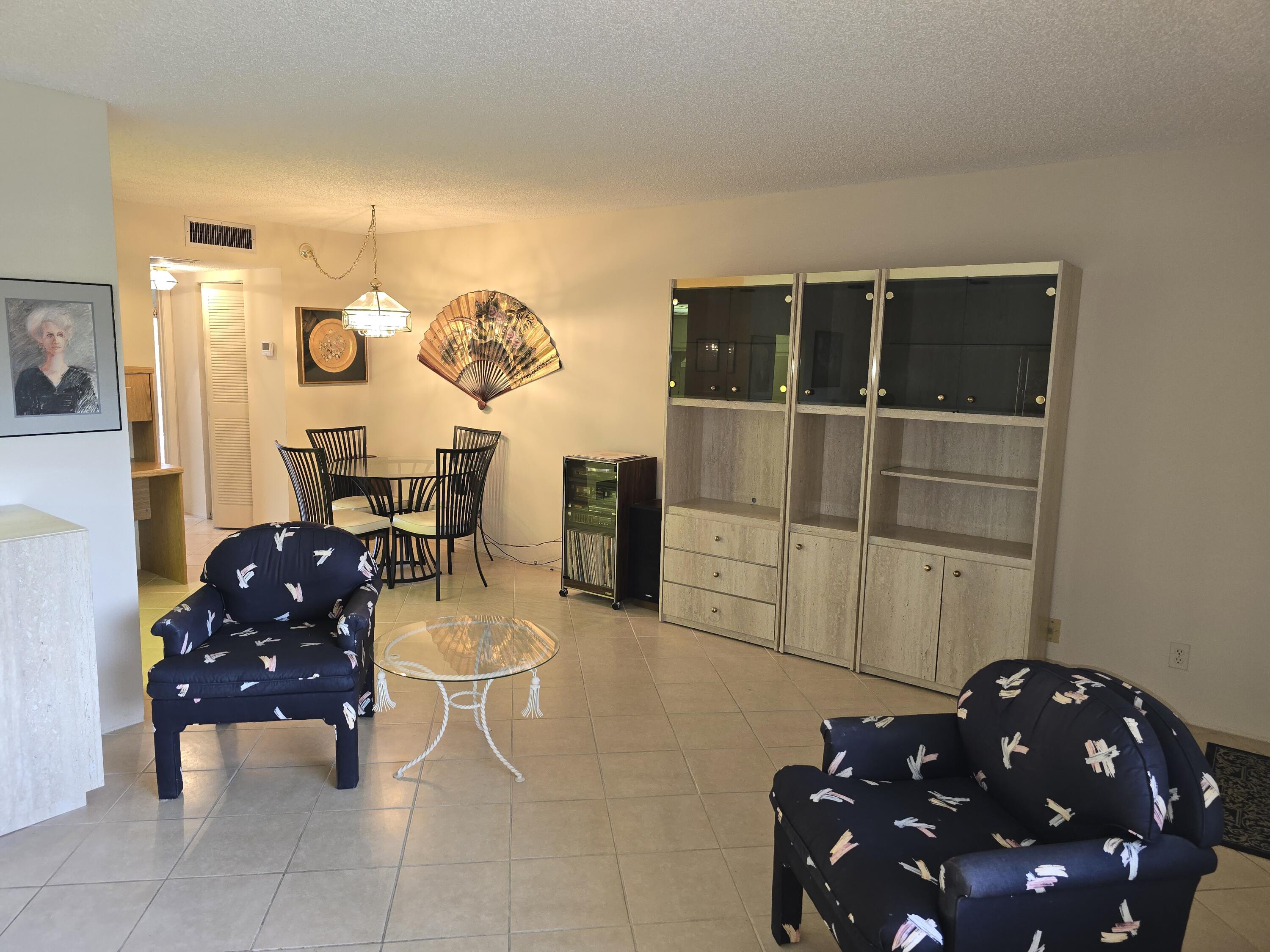 2100 Springdale Boulevard, Unit 306 Palm Springs, FL 33461 - Photo 4 of 21 Living room
