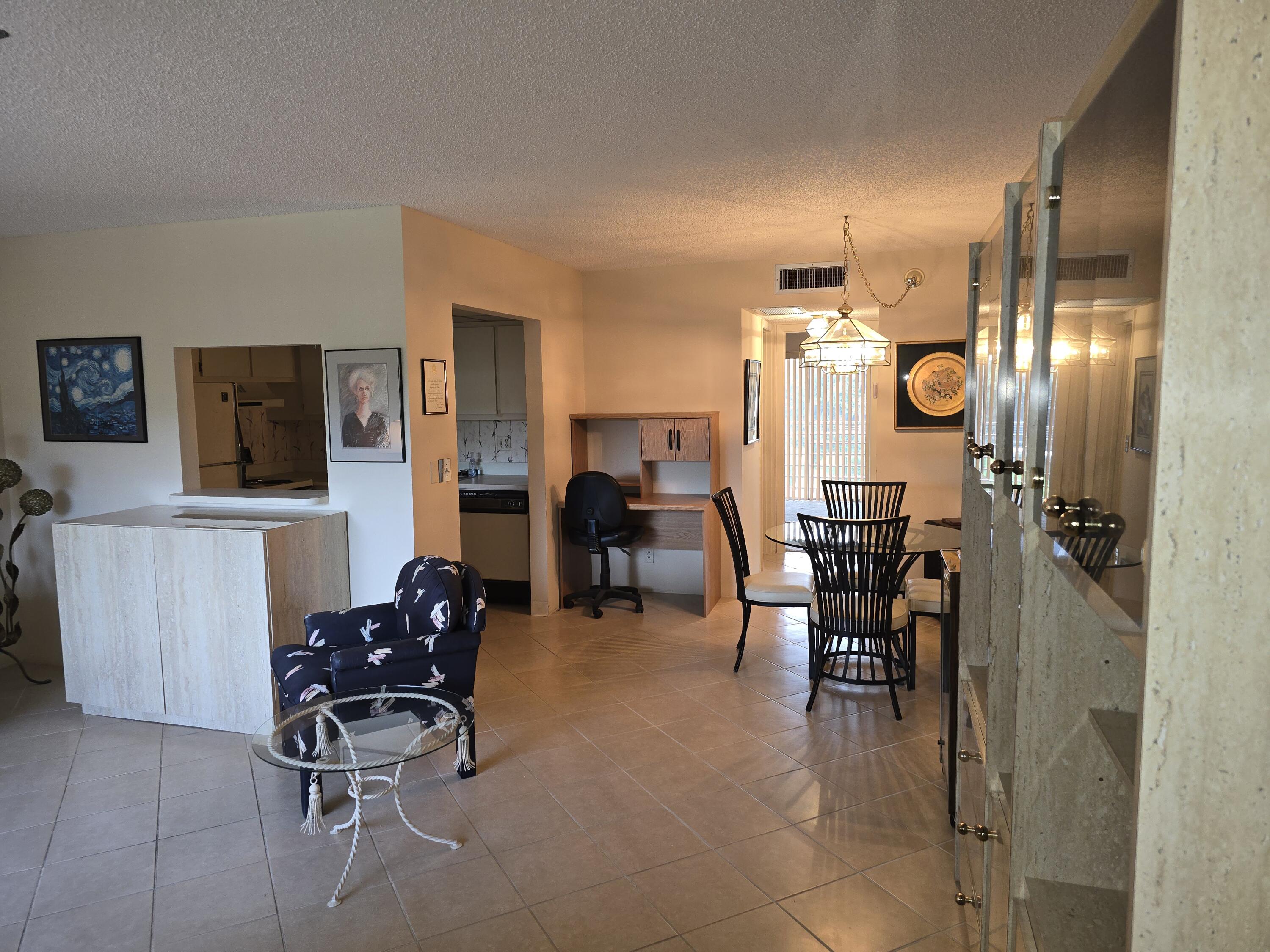 2100 Springdale Boulevard, Unit 306 Palm Springs, FL 33461 - Photo 6 of 21 Living dining room