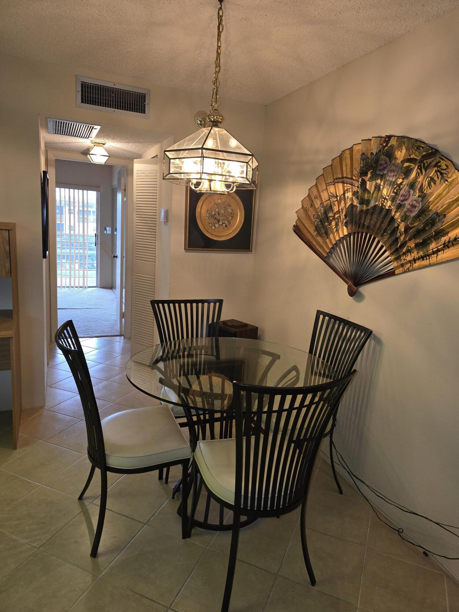 2100 Springdale Boulevard, Unit 306 Palm Springs, FL 33461 - Photo 8 of 21 Dining area