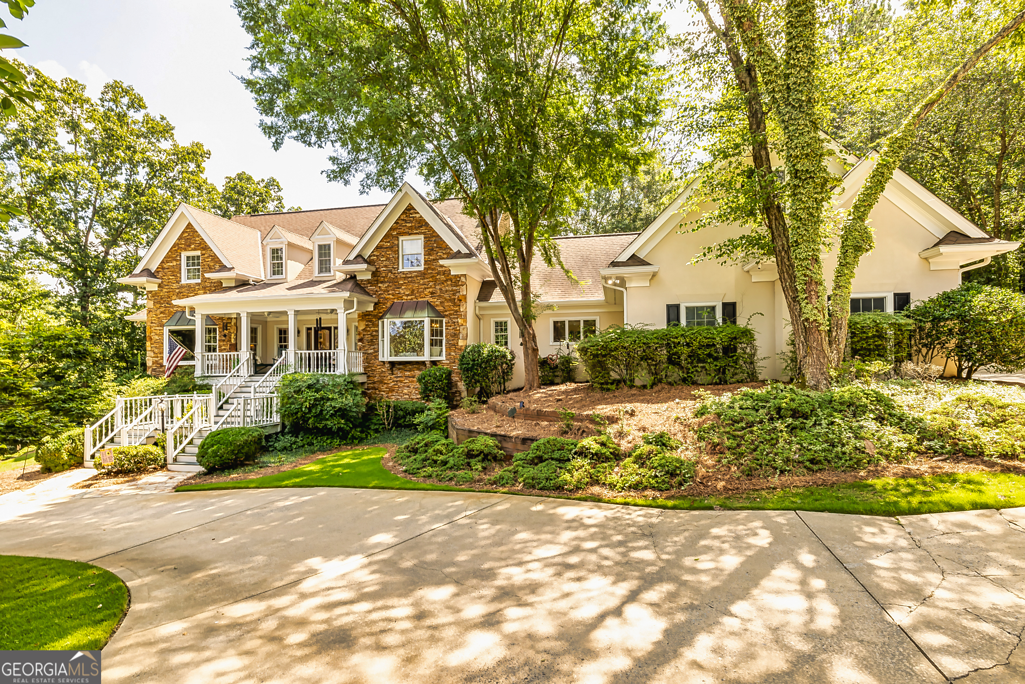 203 Redding Ridge Peachtree City, GA 30269 - Photo 1 of 1 a front view of a house with a yard and outdoor seating