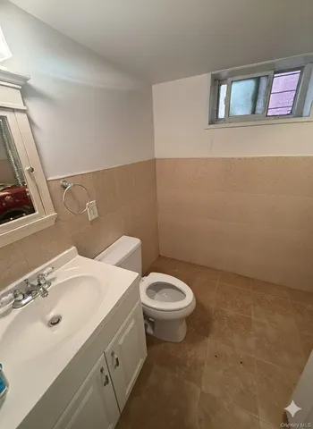 a bathroom with a sink and toilet