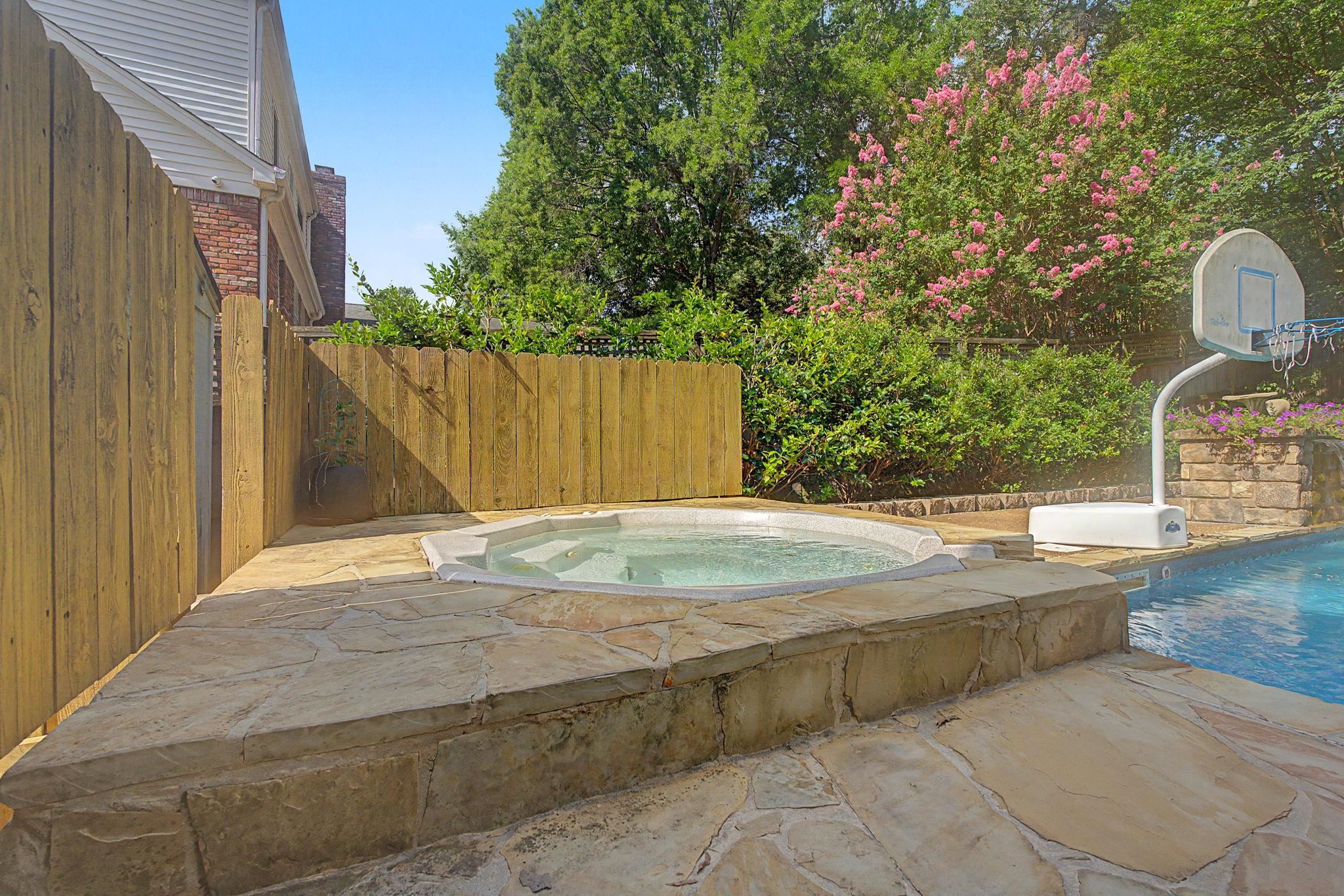 1929 Miller Farms Road Germantown, TN 38138 - Photo 36 of 40 Pool and Hot tub area with stone surround