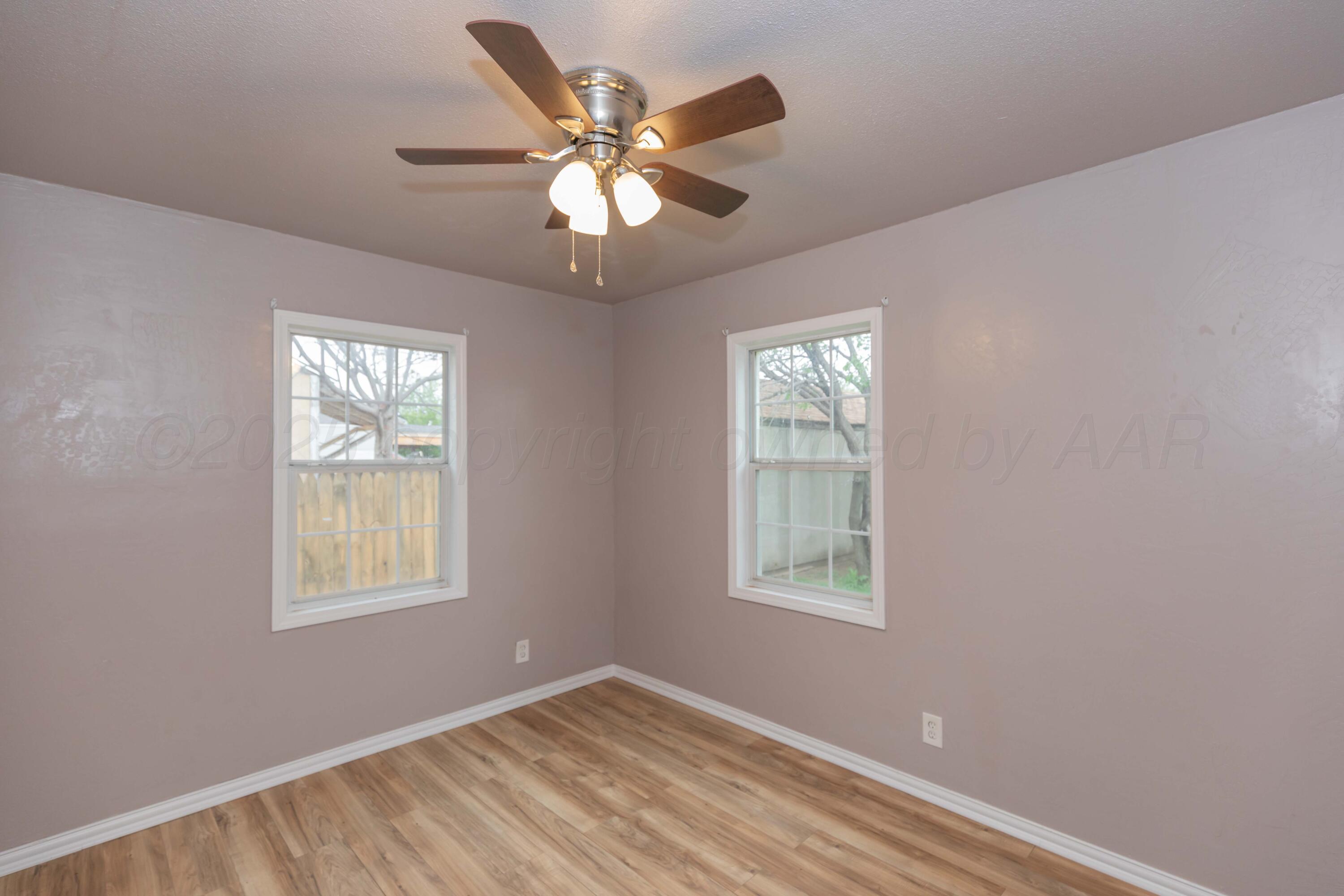 1307 North Buchanan Street Amarillo, TX 79107 - Photo 12 of 31 a view of an empty room with a window