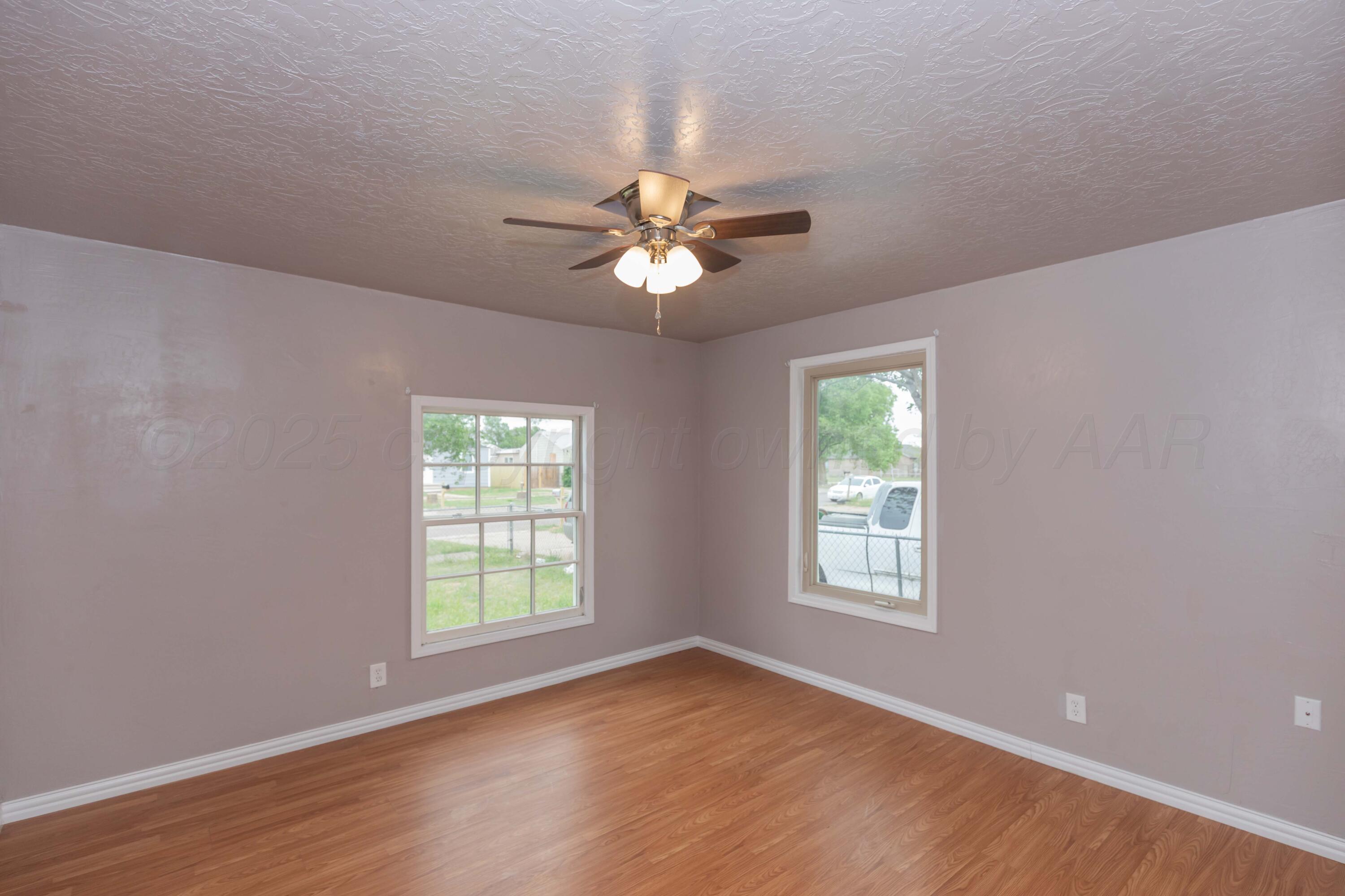 1307 North Buchanan Street Amarillo, TX 79107 - Photo 19 of 31 a view of an empty room with a window