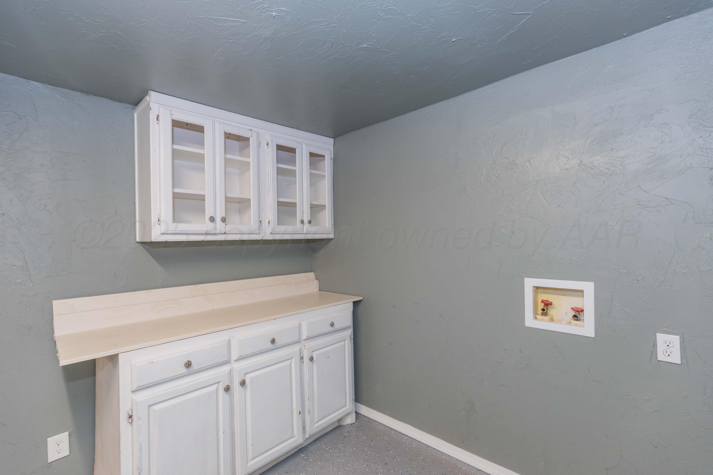 1307 North Buchanan Street Amarillo, TX 79107 - Photo 24 of 31 a view of cabinets