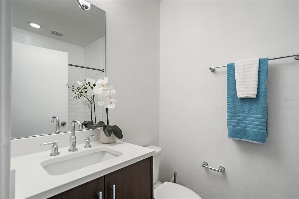 755 Calla Terrace North St. Petersburg, FL 33701 - Photo 20 of 37 a bathroom with a sink vanity and a toilet