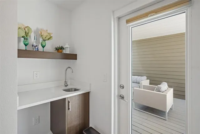 a bathroom with a sink a toilet and vanity