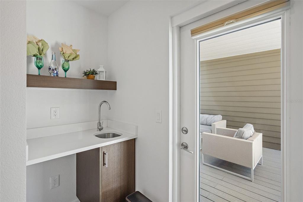 755 Calla Terrace North St. Petersburg, FL 33701 - Photo 22 of 37 a bathroom with a sink a toilet and vanity