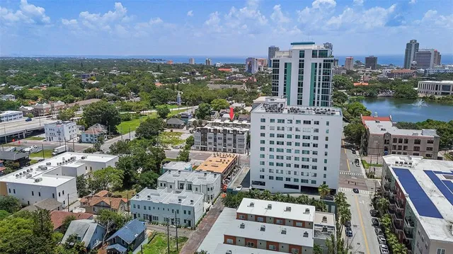 a view of city with tall buildings