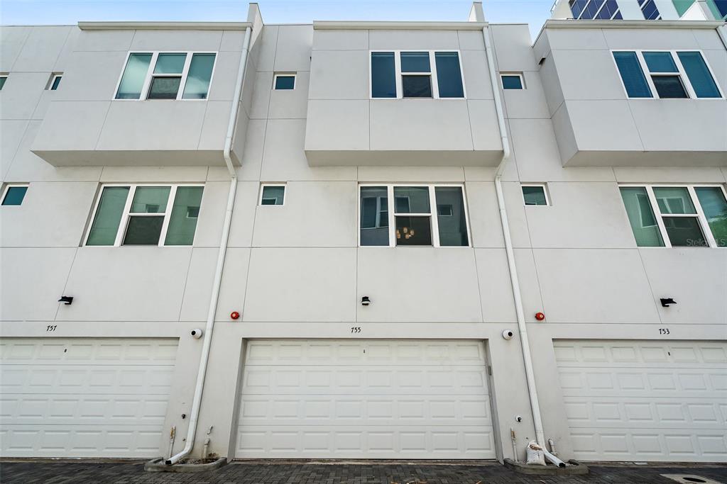 755 Calla Terrace North St. Petersburg, FL 33701 - Photo 4 of 37 view of building with large windows