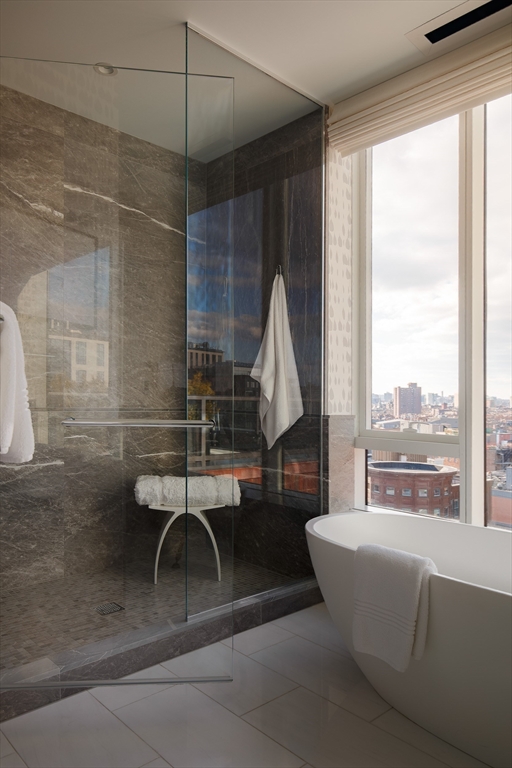 380 Harrison Avenue, Unit 12F Boston, MA 02118 - Photo 16 of 38 a living room with furniture