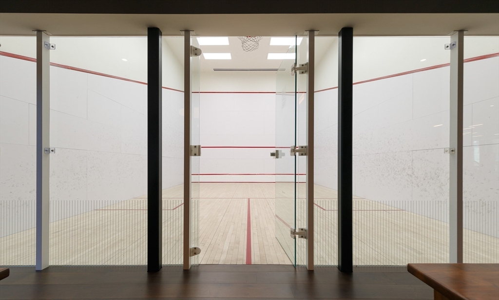 380 Harrison Avenue, Unit 12F Boston, MA 02118 - Photo 30 of 38 a bathroom with a glass shower door