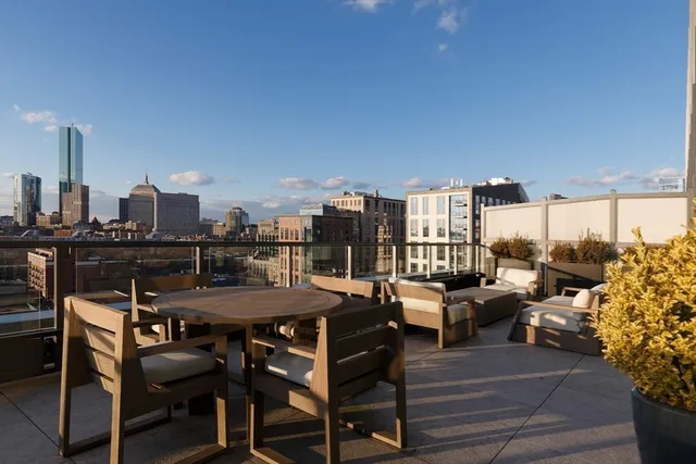 a view of a terrace with sitting area