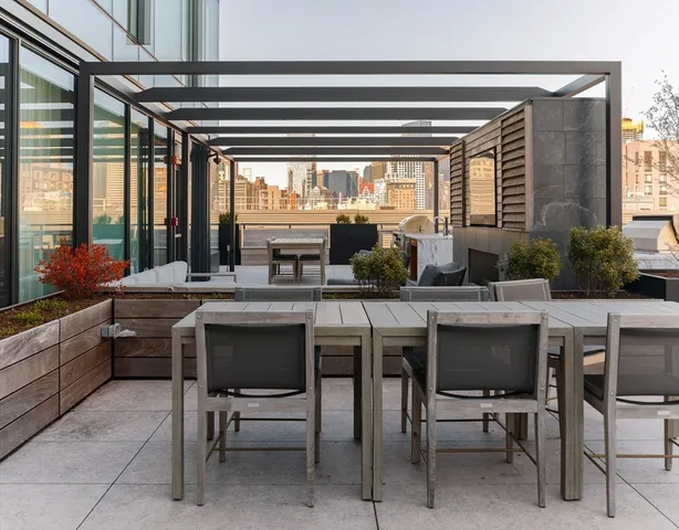 a kitchen with a table and chairs in it
