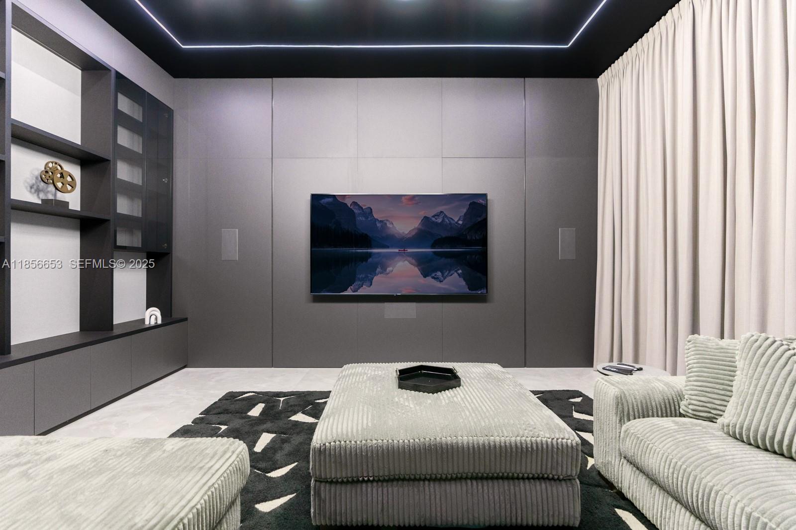 80 Northwest 129th Avenue Miami, FL 33182 - Photo 24 of 34 a bedroom with a bed and a couch