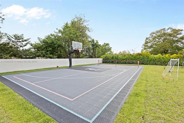 a view of an outdoor space and tennis court