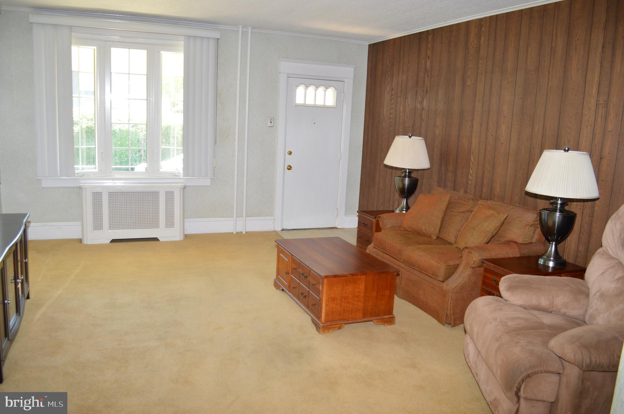 204 Ryers Avenue Cheltenham, PA 19012 - Photo 11 of 51 a living room with furniture and a window