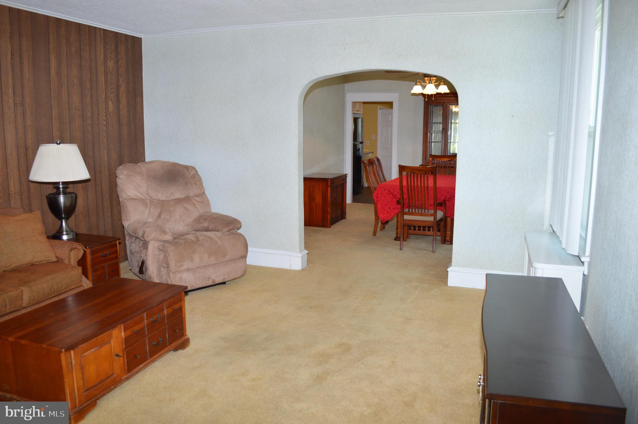 204 Ryers Avenue Cheltenham, PA 19012 - Photo 13 of 51 a living room with furniture and a mirror