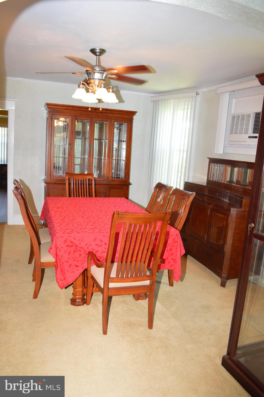 204 Ryers Avenue Cheltenham, PA 19012 - Photo 16 of 51 a living room with furniture and a chandelier