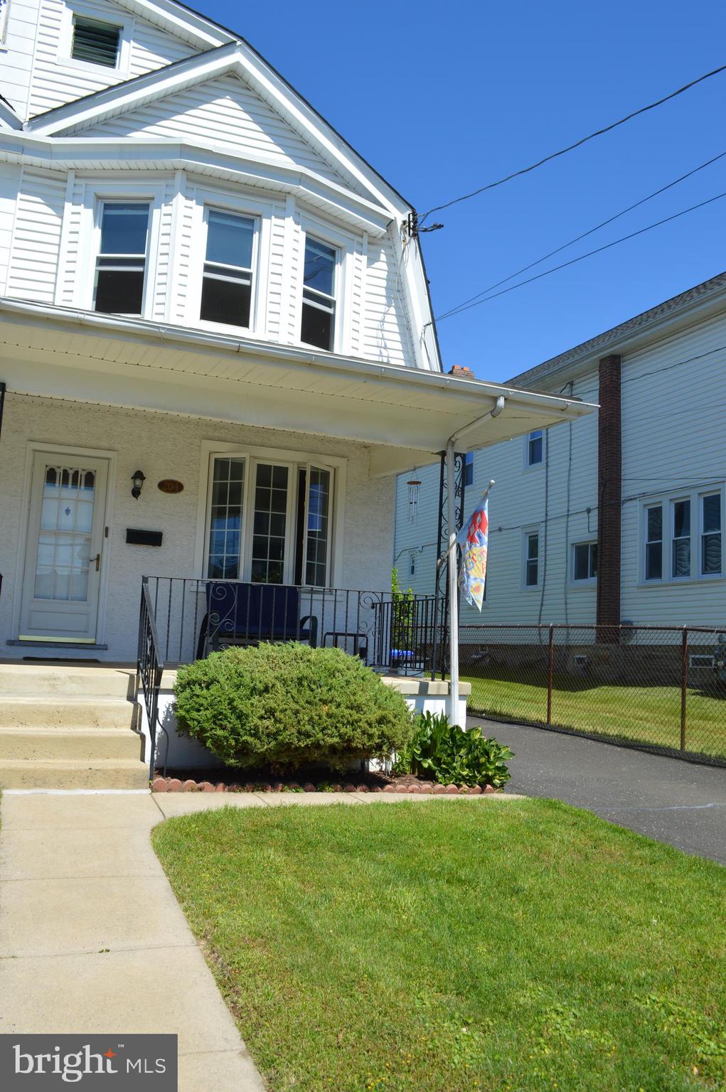 204 Ryers Avenue Cheltenham, PA 19012 - Photo 3 of 51 a front view of a house with a yard