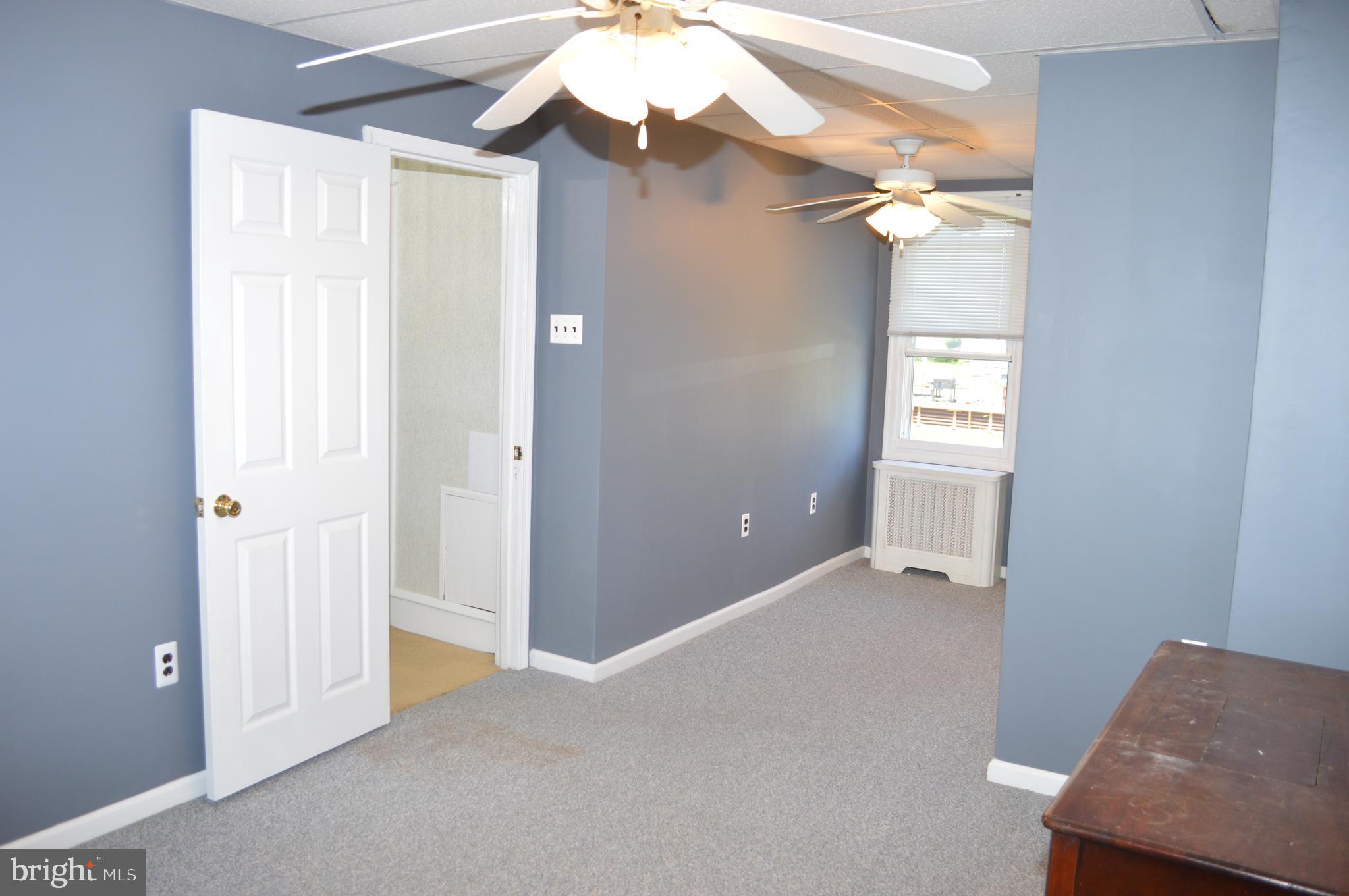 204 Ryers Avenue Cheltenham, PA 19012 - Photo 31 of 51 a view of an empty room with a chandelier fan