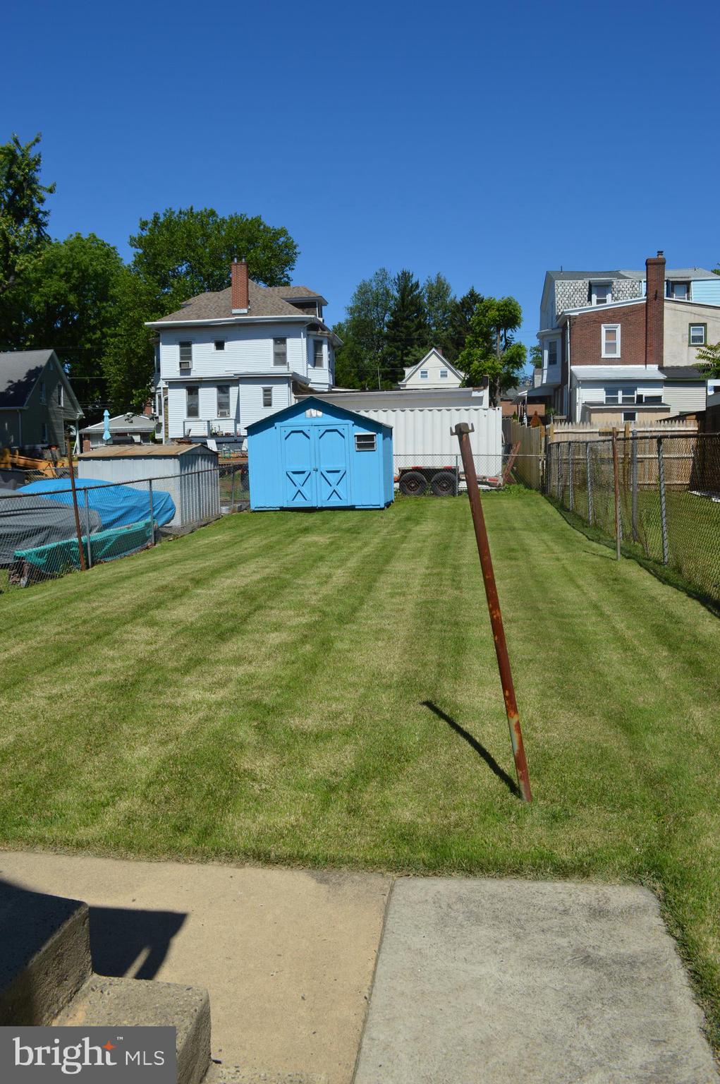 204 Ryers Avenue Cheltenham, PA 19012 - Photo 48 of 51 a view of a swimming pool with a yard