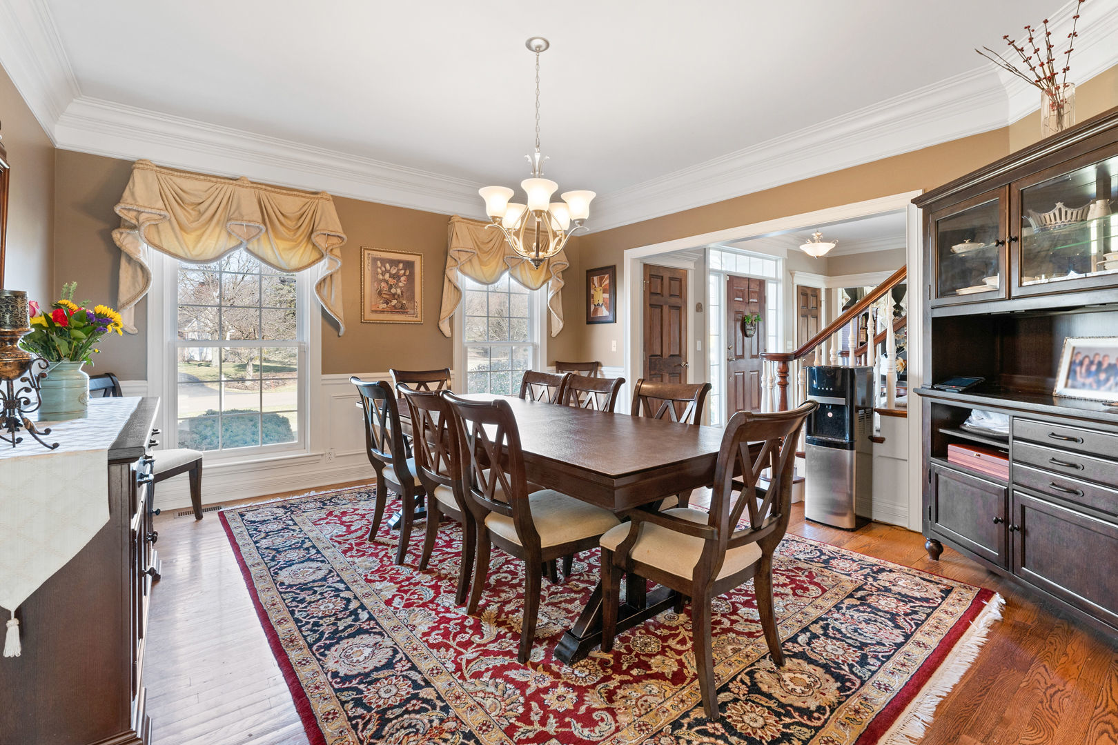 5-n098 Maple Court St. Charles, IL 60175 - Photo 13 of 34 a view of a dining room with furniture window and wooden floor
