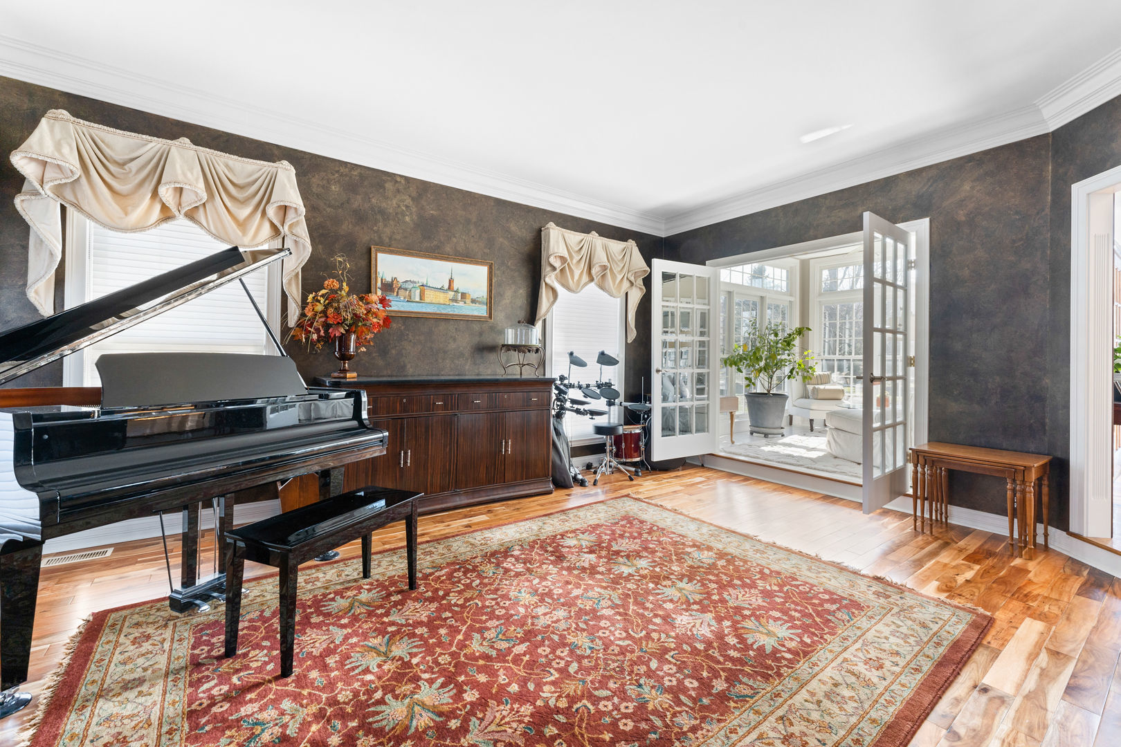 5-n098 Maple Court St. Charles, IL 60175 - Photo 14 of 34 a living room with a piano a rug and a large window