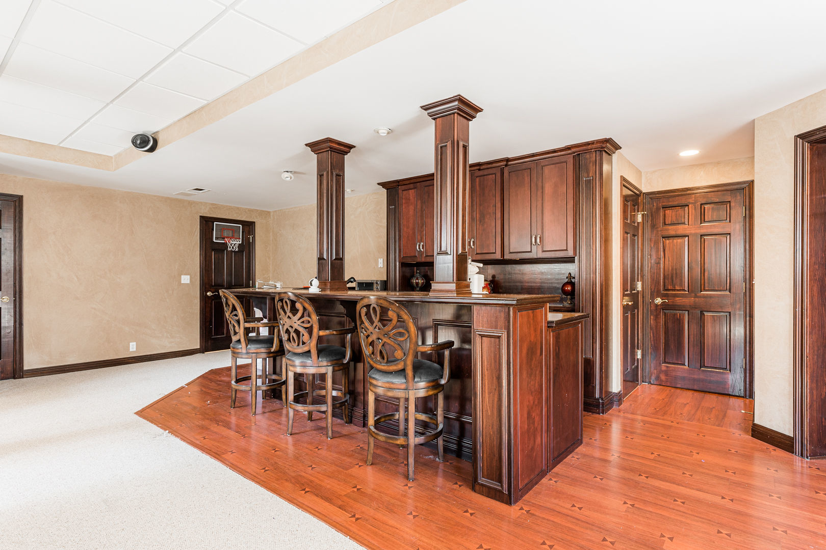 5-n098 Maple Court St. Charles, IL 60175 - Photo 29 of 34 a room with lots of chairs and wooden floor