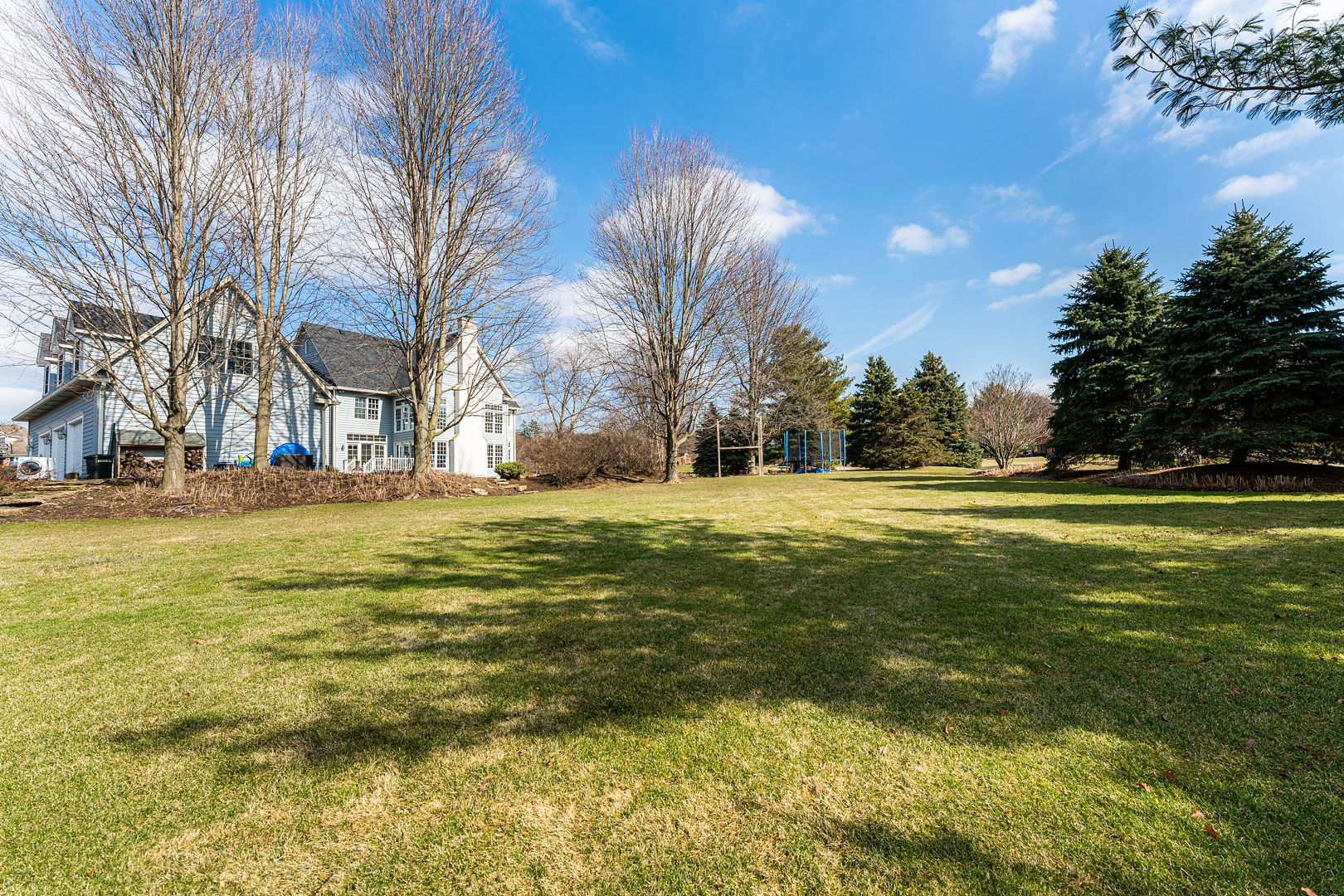 5-n098 Maple Court St. Charles, IL 60175 - Photo 33 of 34 a view of road with large trees