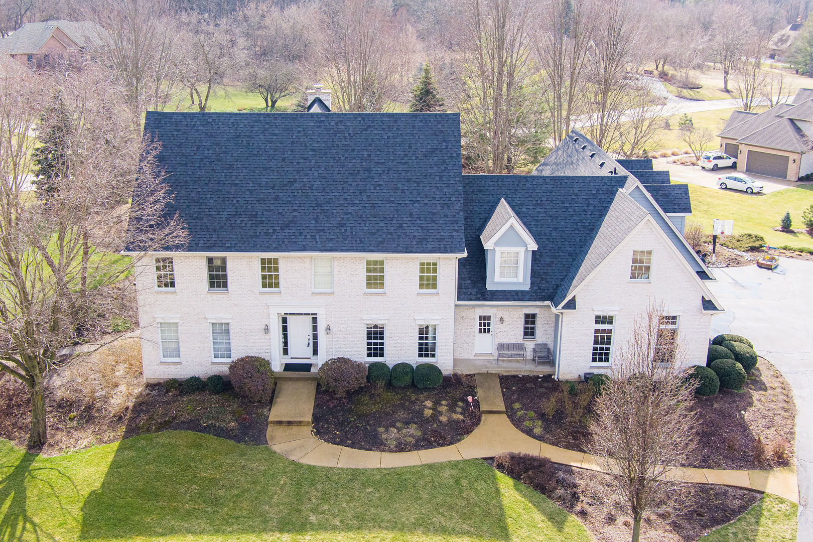 5-n098 Maple Court St. Charles, IL 60175 - Photo 4 of 34 front view of house with a yard