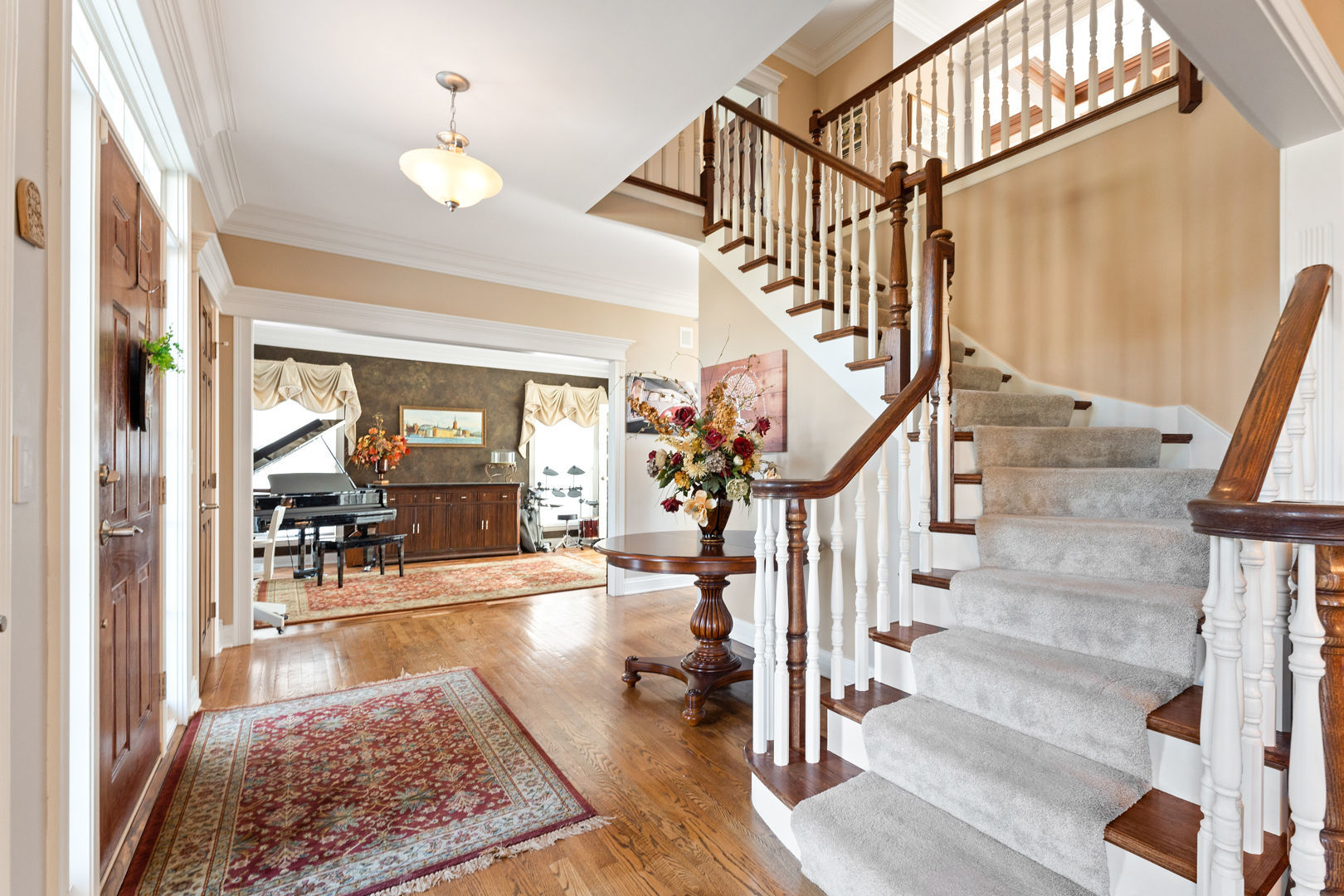 5-n098 Maple Court St. Charles, IL 60175 - Photo 6 of 34 a view of entryway and hall with wooden floor