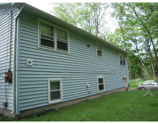 98 Pelham Road Amherst, MA 01002 - Photo 2 of 2 a view of a back yard of the house