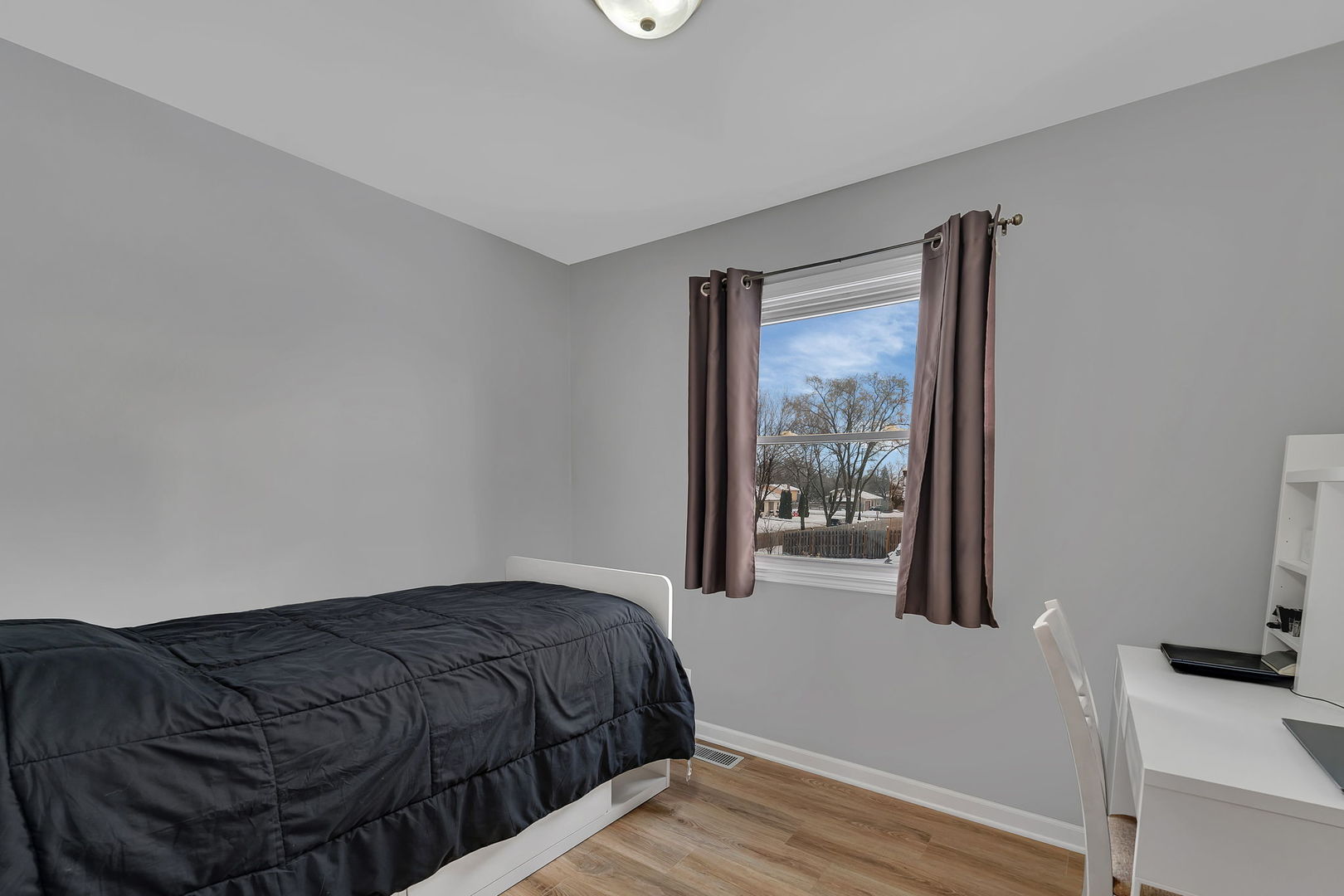 700 Evergreen Court Romeoville, IL 60446 - Photo 17 of 27 a bedroom with a bed and window