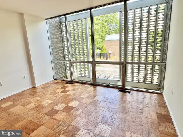 a view of an empty room and window