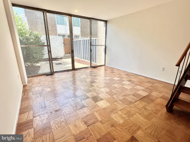 a view of an empty room and window