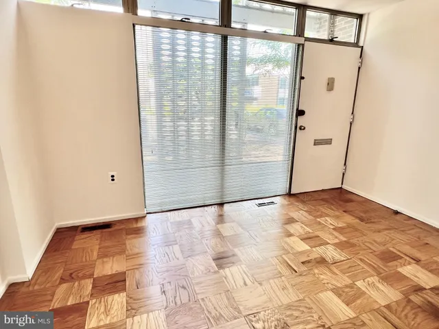 a view of empty room with a window