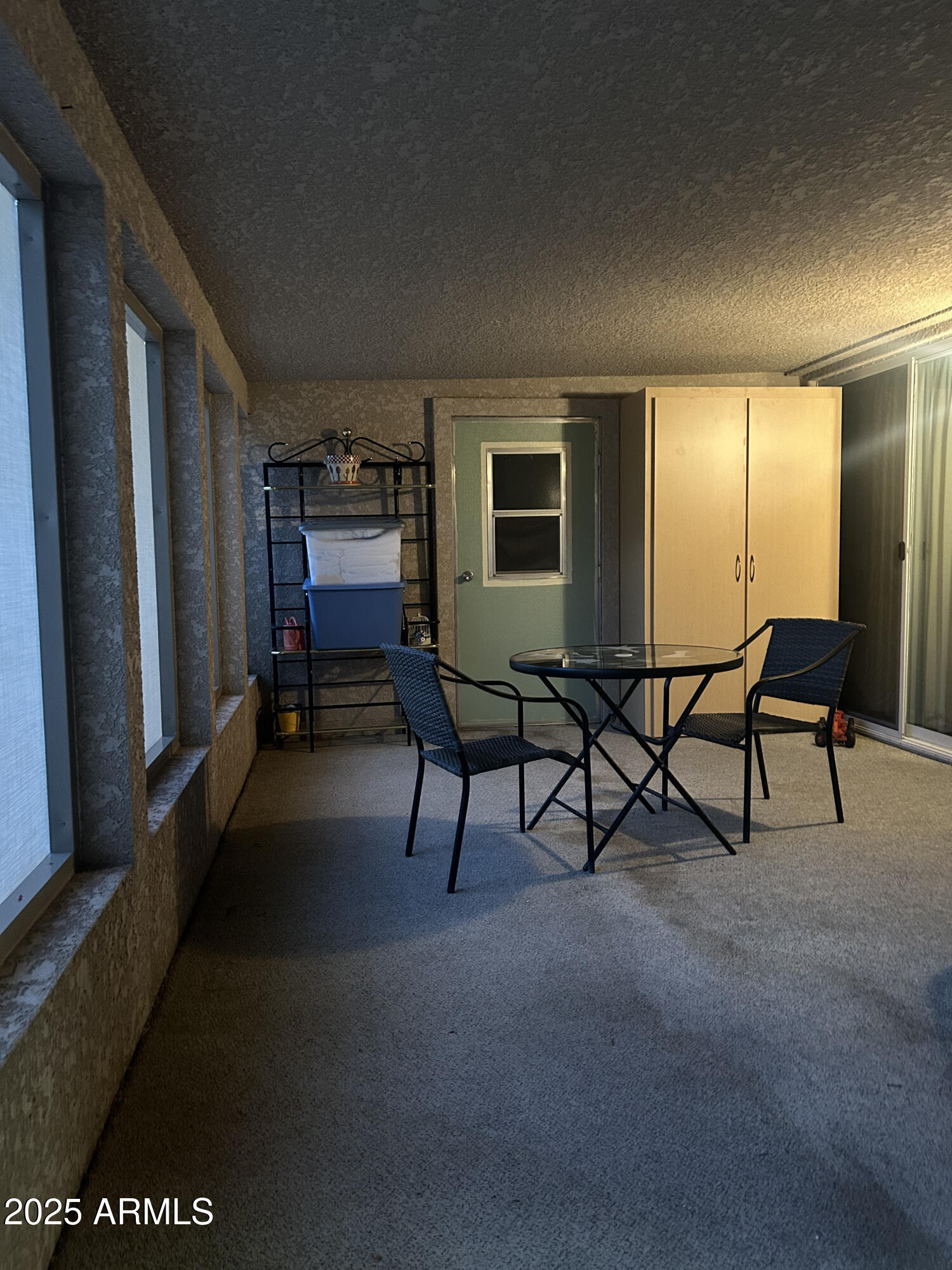 3301 South Goldfield Road, Unit 3011 Apache Junction, AZ 85119 - Photo 11 of 65 a room with furniture and a window