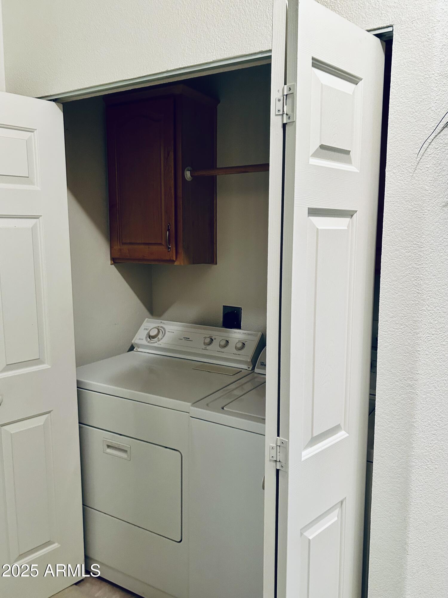 3301 South Goldfield Road, Unit 3011 Apache Junction, AZ 85119 - Photo 26 of 65 a utility room with dryer and washer