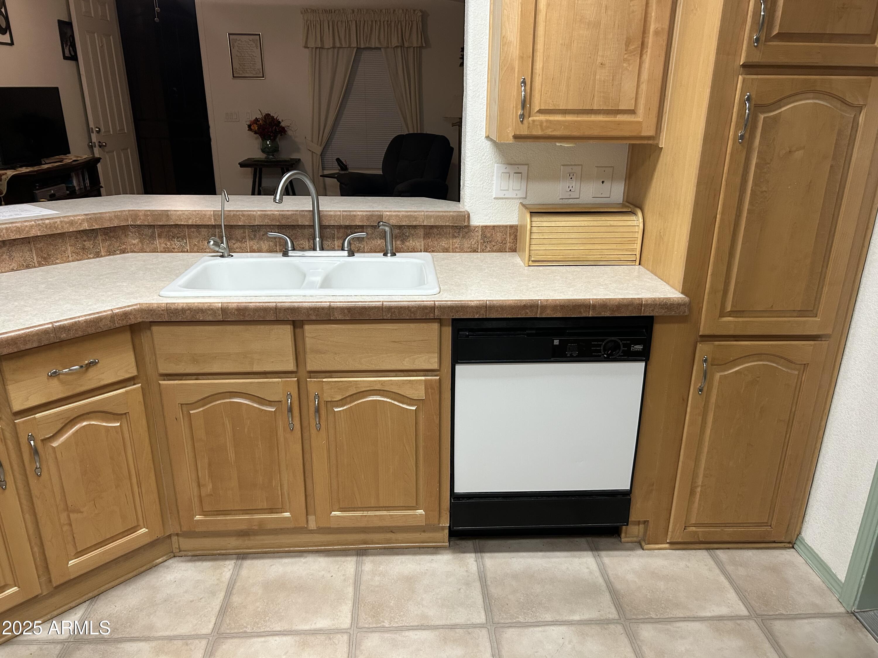 3301 South Goldfield Road, Unit 3011 Apache Junction, AZ 85119 - Photo 43 of 65 a bathroom with a sink and a mirror