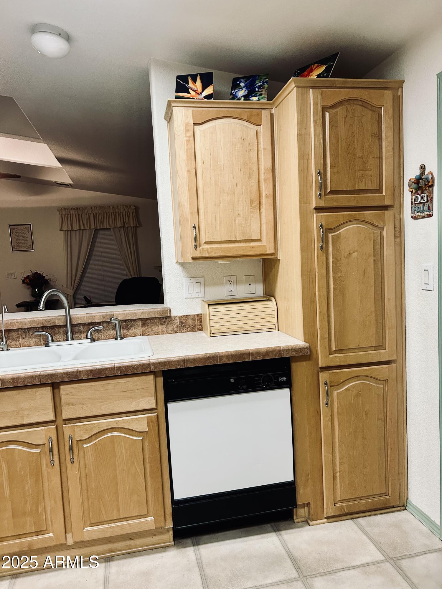3301 South Goldfield Road, Unit 3011 Apache Junction, AZ 85119 - Photo 44 of 65 a bathroom with a sink and a mirror